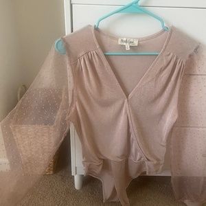 Light pink body suit